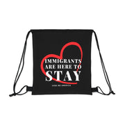 Immigrants are here to stay Outdoor Drawstring Bag black