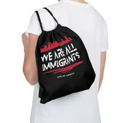 We are all immigrants Outdoor Drawstring Bag black