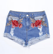 Embroidered floral stitching curled denim shorts