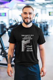 Gun safety is a lifelong commitment Point guns down Unisex Softstyle T-Shirt