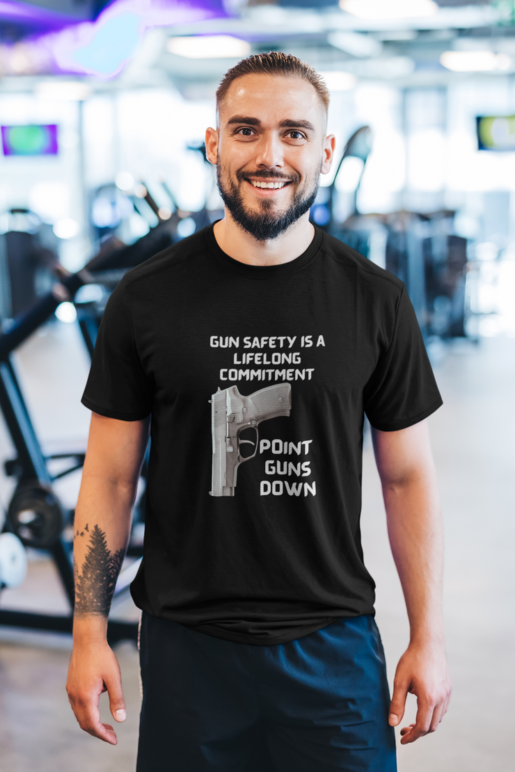 Gun safety is a lifelong commitment Point guns down Unisex Softstyle T-Shirt