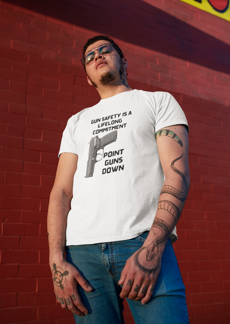 Gun safety is a lifelong commitment Point guns down Unisex Softstyle T-Shirt