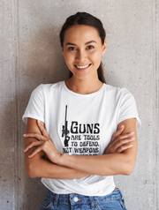 Guns are tools to defend, not weapons to intimidate women's Favorite Tee