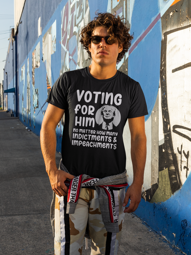 Voting for him no matter how many indictments and impeachments Unisex Softstyle T-Shirt